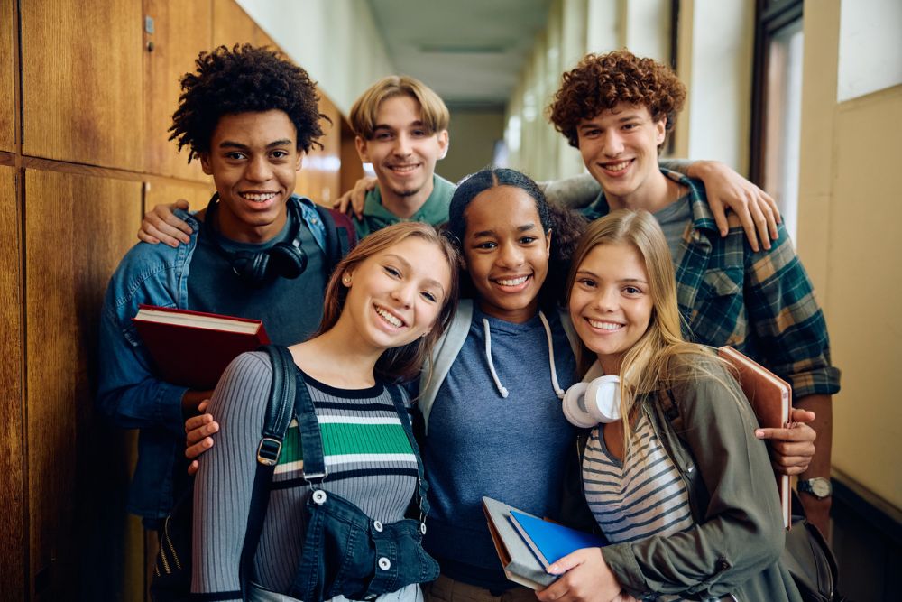 iStock-1912511508-1000x667 students in hallway